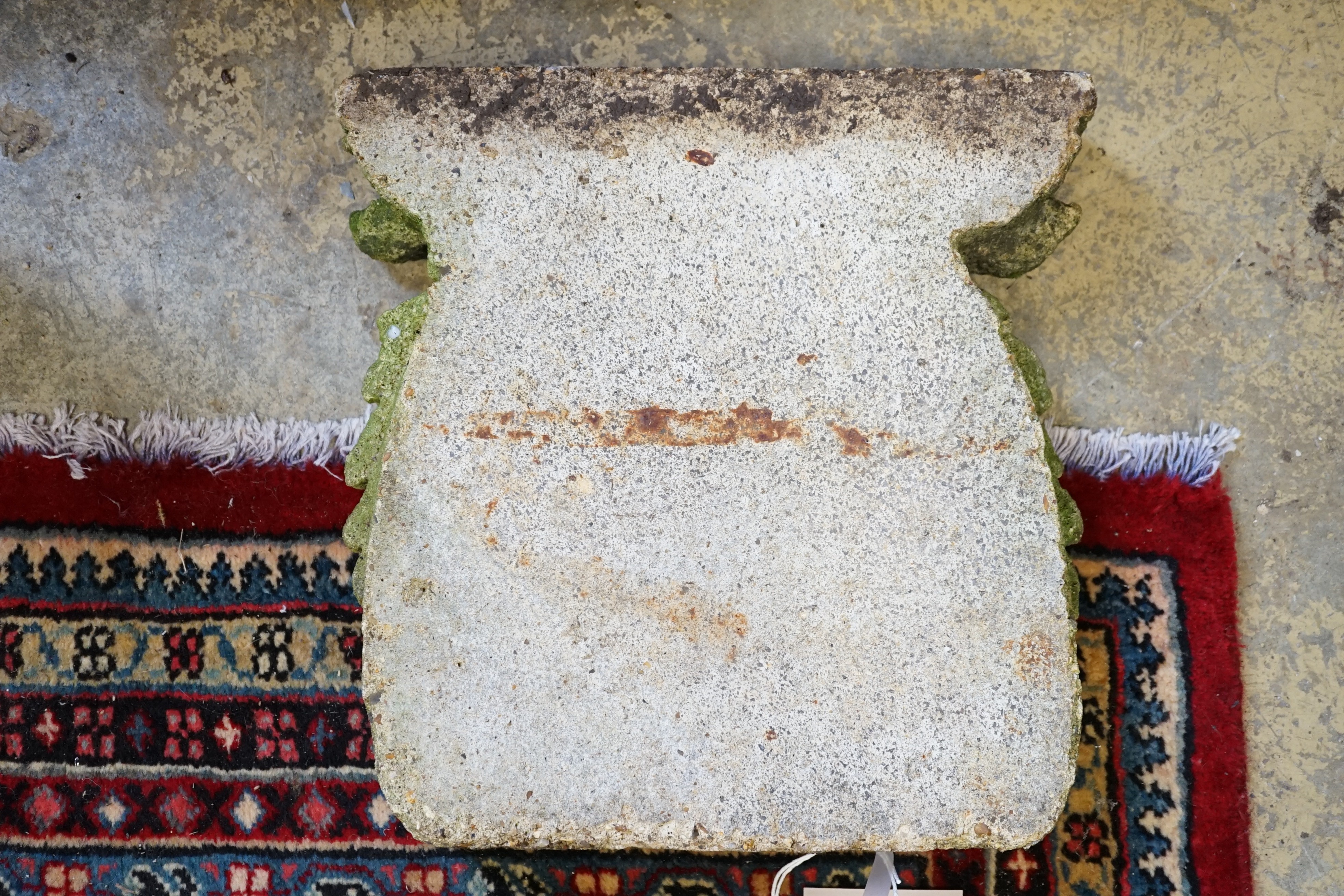 A reconstituted stone vertical sundial, height 33cm, width 32cm